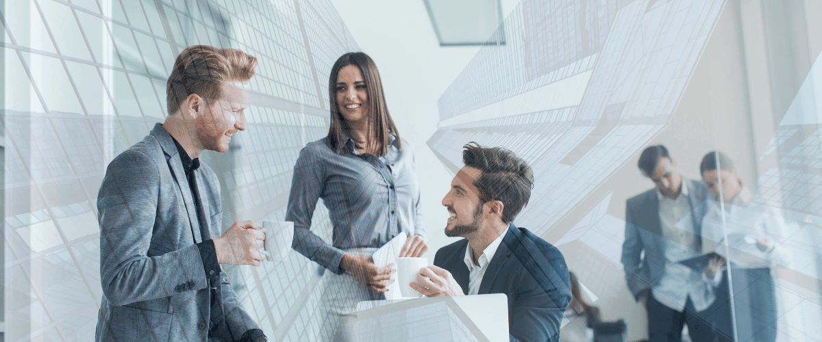 Three office workers in a generic room discussing the positives of unfair dismissal claims as a day one right.